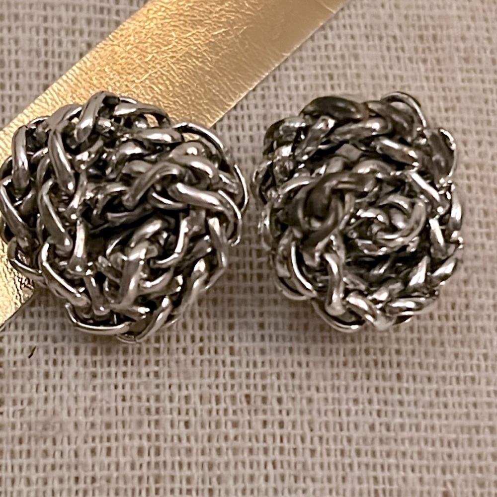 Silver knot stud earrings for classic twist on a stud